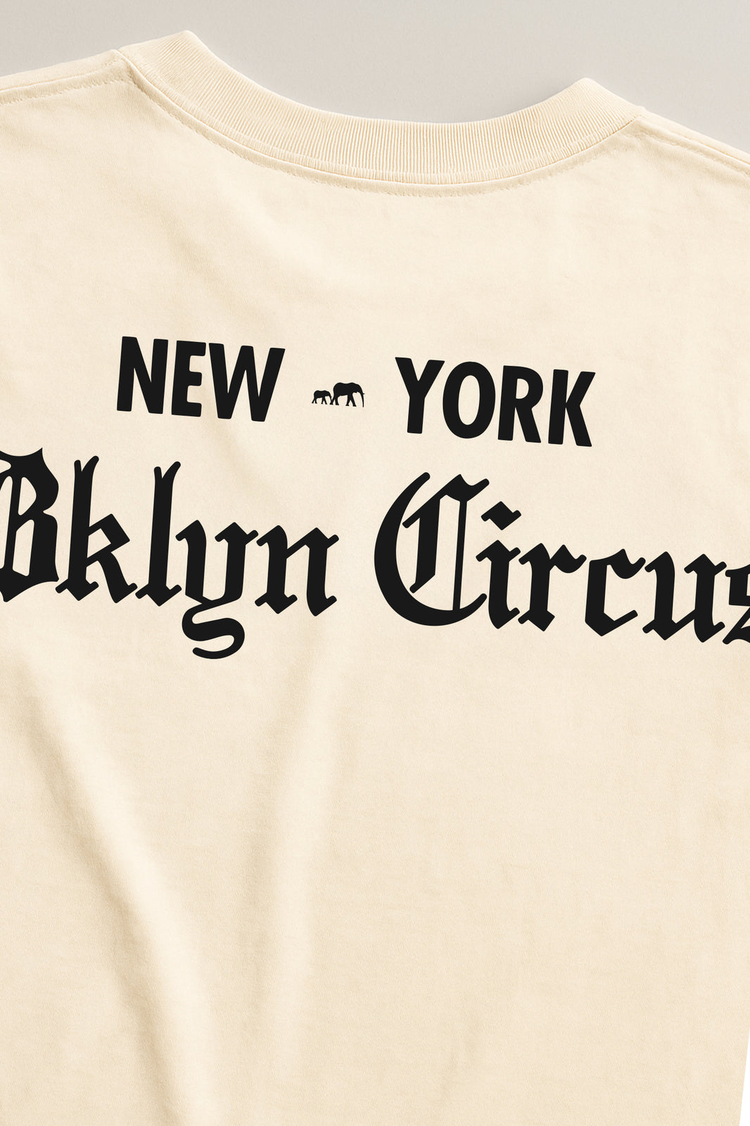 (Pre-Order)The Brooklyn Circus Old English Tee (Natural)